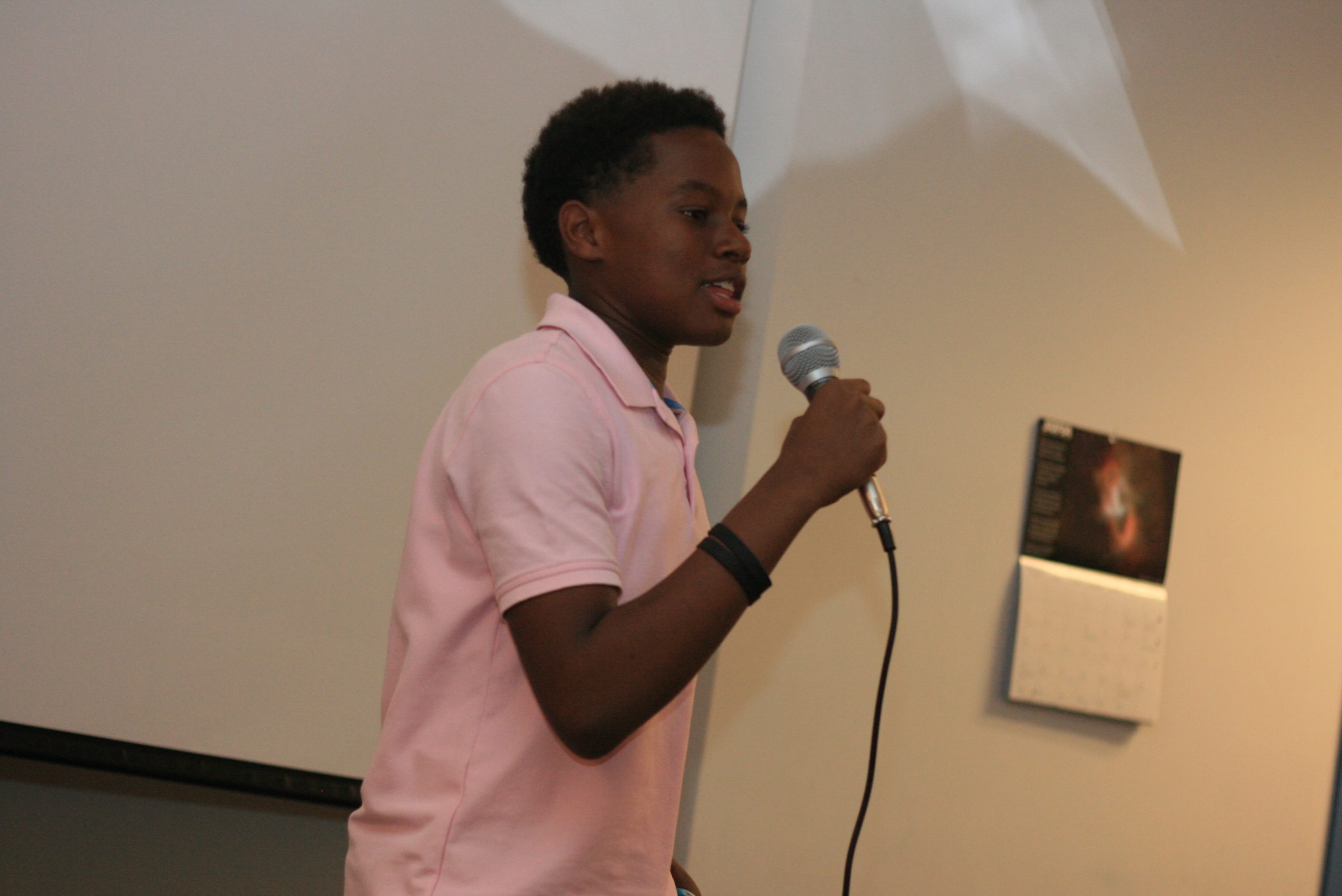 Odyssey Junior student reading aloud