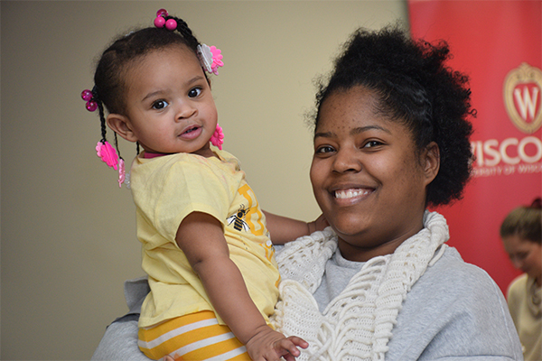 Adult Odyssey student with toddler daughter