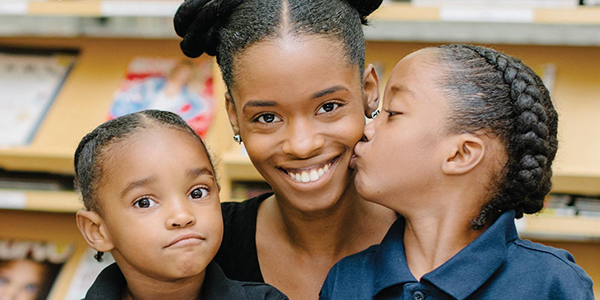 Onward Odyssey student Jelissa with her kids, on the cover of BRAVA magazine