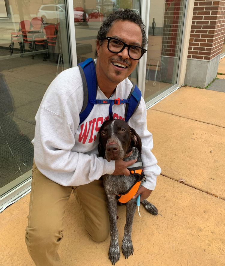 Success coach Brian Benford and his therapy dog, Duke Ellington