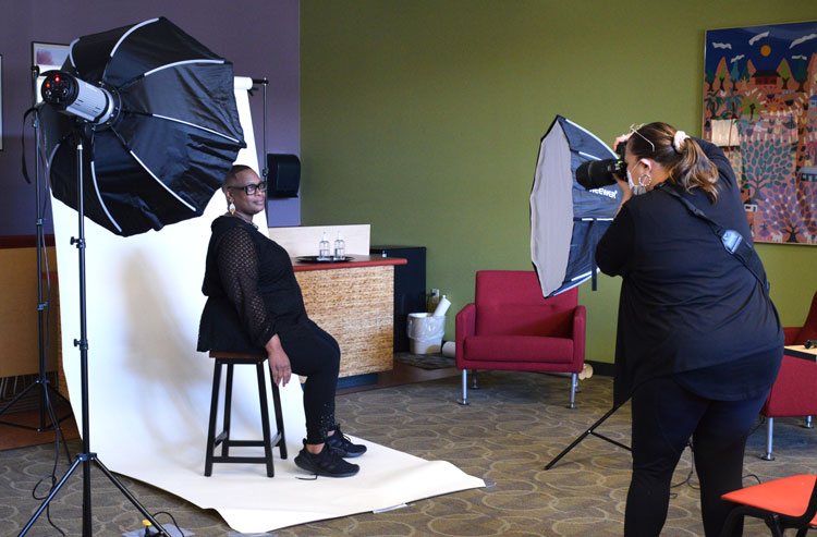 Former Odyssey student Hedi Lamarr Rudd taking photos of the Odyssey class of 2012