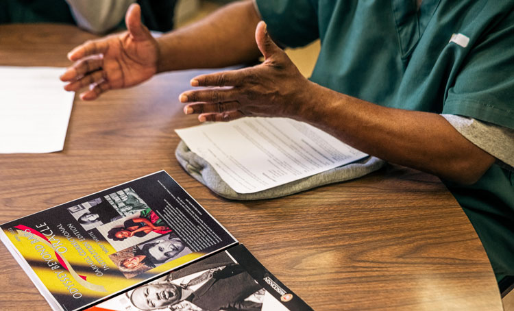 A student at Oakhill Correctional this semester with his copy of the newest Oracle
