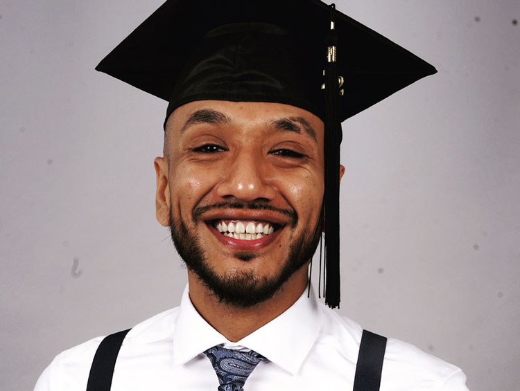 Michael Lozano in his graduation cap