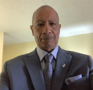 headshot of Robert Taliaferro, wearing a suit