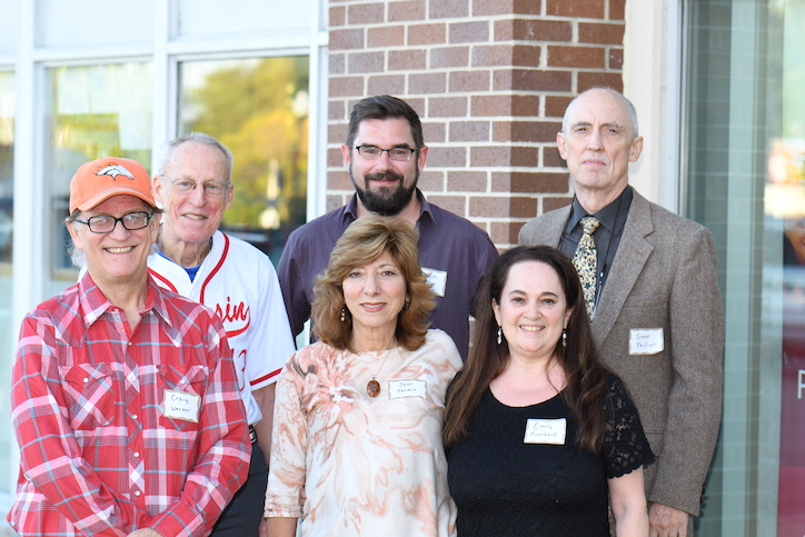 A group of six UW–Madison Odyssey Project instructors stand together smiling.