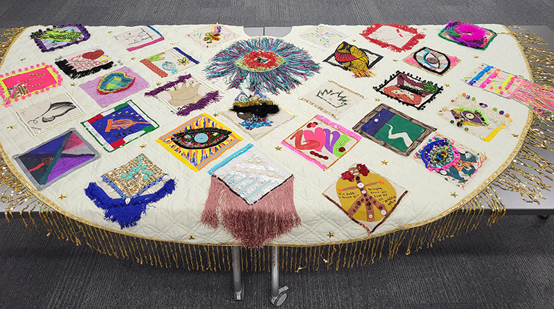 The cape laid out on a table