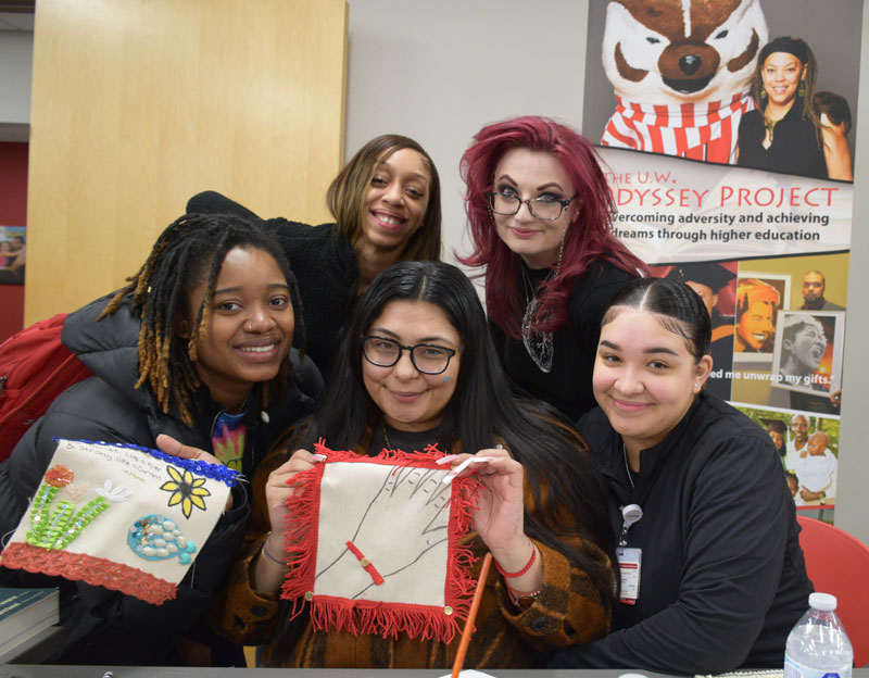 Mona, Gabby, Roxanna, Kaitlin and Sinetra holding up their squares