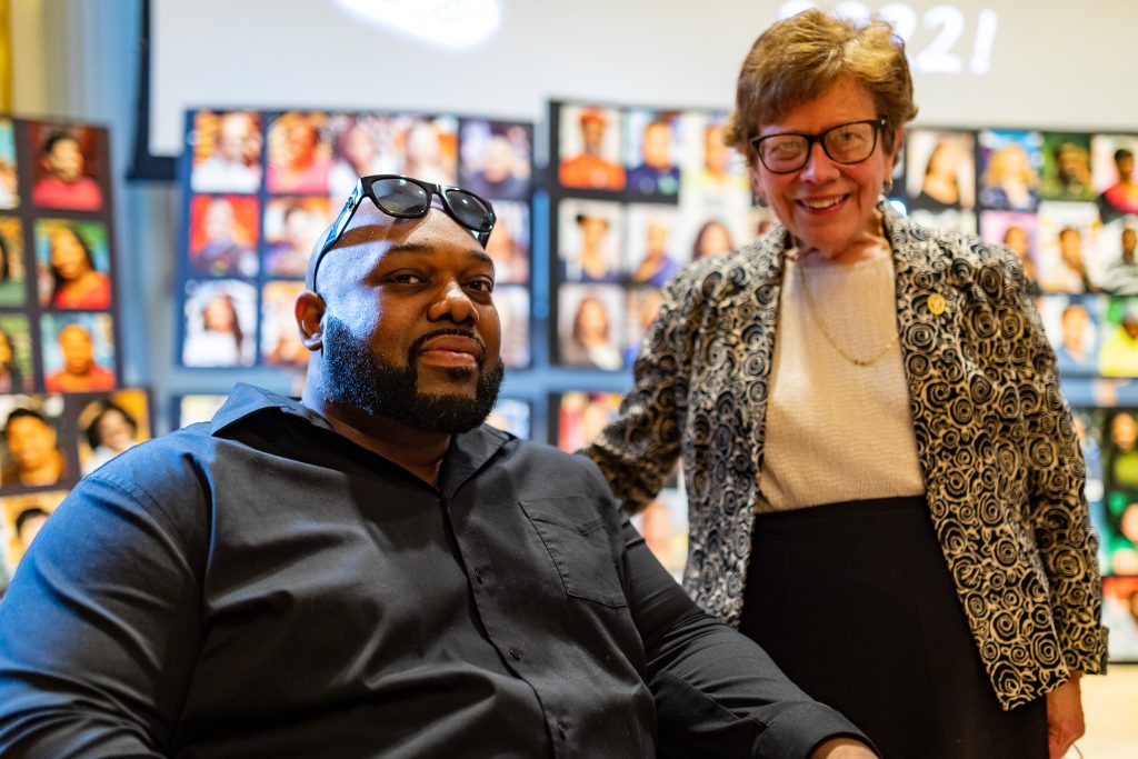 Former UW Chancellor Rebecca Blank with student Jonathon