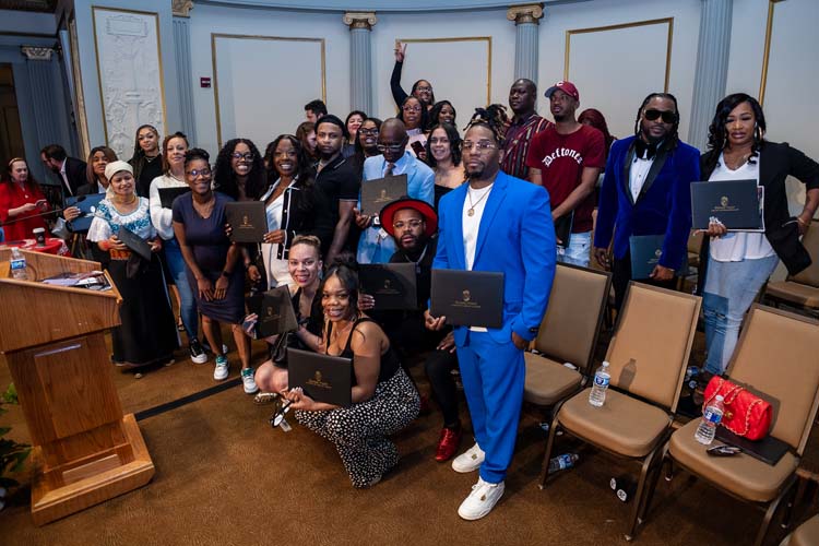 Odyssey students, staff, community members, etc, at the 2024 Odyssey graduation ceremony