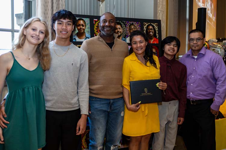 Odyssey students, staff, community members, etc, at the 2024 Odyssey graduation ceremony