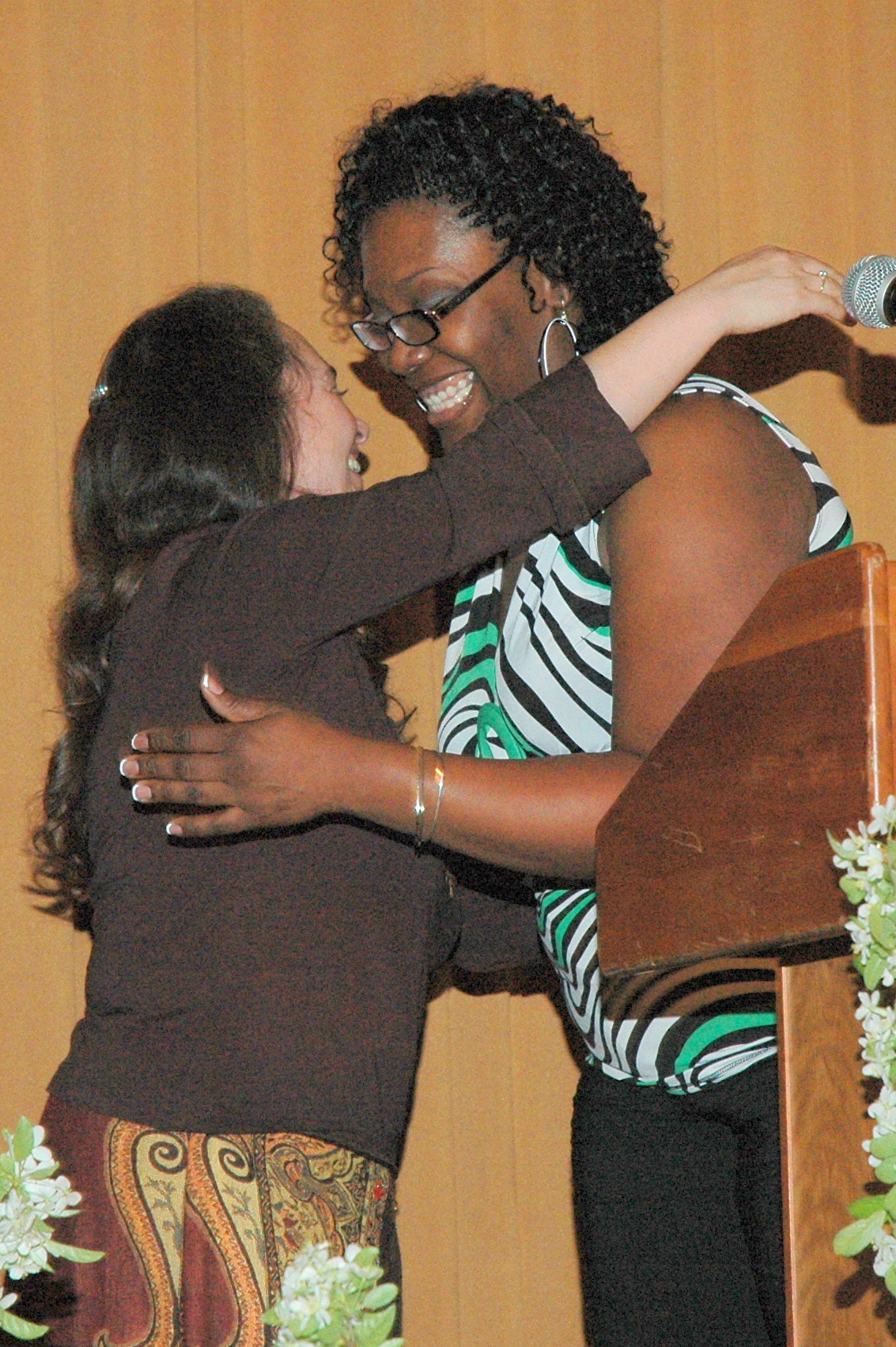 Odyssey students, staff, community, etc, hugging